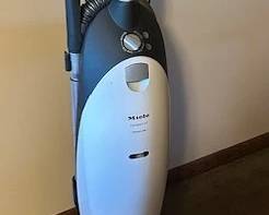 Miele Swivel Neck Upright Vacuum Cleaner.