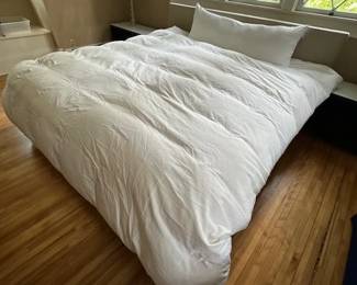 King-Sized platform bed with linen headboard (comforter not for sale.