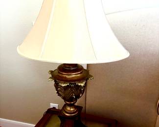 Pair of tall gold base lamps