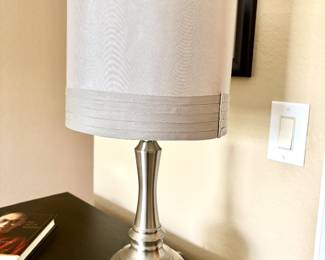 Contemporary pair of chrome lamps