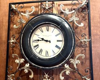 Metal framed wall clock