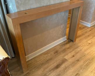 Sofa/entry table. This table was made to fit behind the antique sofa and has holes for lamp cords. Could be used behind a bed headboard, in an entryway, and more! Made of solid wood. Measures 38"H x 57"L x 8"W. $375. Call Patty (or text) with offers to buy and setup a pickup. We will make pickup easy for you! 847-772-0404.