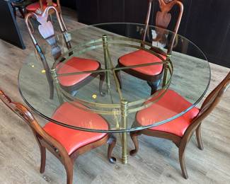 Beautiful brass and glass round table with 6 Hickory reupholstered chairs (only 4 shown). All for $1200. Call Patty (or text) with offers to buy and setup a pickup. We will make pickup easy for you! 847-772-0404.
