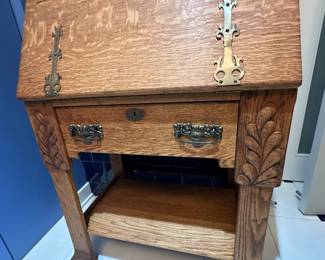 Antique Secretary. In good condition. There are no supports under the drop top for the desk other than the drawer. Measures 50"H x 28"W x 15 1/2"D. $275. Call Patty (or text) with offers to buy and setup a pickup. We will make pickup easy for you! 847-772-0404.