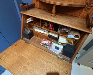 Antique Secretary. In good condition. There are no supports under the drop top for the desk other than the drawer. Measures 50"H x 28"W x 15 1/2"D. $275. Call Patty (or text) with offers to buy and setup a pickup. We will make pickup easy for you! 847-772-0404.