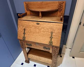 Antique Secretary. In good condition. There are no supports under the drop top for the desk other than the drawer. Measures 50"H x 28"W x 15 1/2"D. $275. Call Patty (or text) with offers to buy and setup a pickup. We will make pickup easy for you! 847-772-0404.
