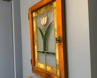 Antique stained glass cabinet front. Measures 29"H x 20"W x 1 1/2"D. $150. Sofa/entry table. Call Patty (or text) with offers to buy and setup a pickup. We will make pickup easy for you! 847-772-0404.
