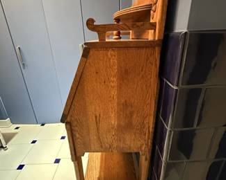 Antique Secretary. In good condition. There are no supports under the drop top for the desk other than the drawer. Measures 50"H x 28"W x 15 1/2"D. $275. Call Patty (or text) with offers to buy and setup a pickup. We will make pickup easy for you! 847-772-0404.