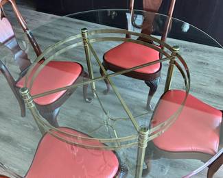 Beautiful brass and glass round table with 6 Hickory reupholstered chairs (only 4 shown). All for $1200. Call Patty (or text) with offers to buy and setup a pickup. We will make pickup easy for you! 847-772-0404.