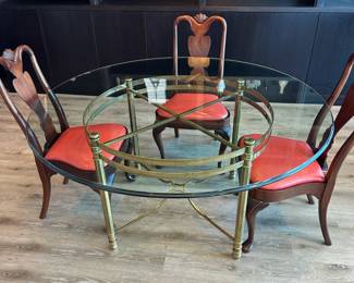 Beautiful brass and glass round table with 6 Hickory reupholstered chairs (only 4 shown). All for $1200. Call Patty (or text) with offers to buy and setup a pickup. We will make pickup easy for you! 847-772-0404.