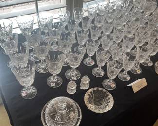 Table full of Waterford crystal some Baccarat and other