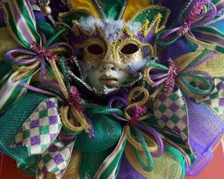 Mardi Gras wreath - also have garland, party decor and favors.