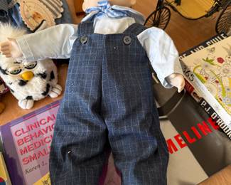 Several dolls.