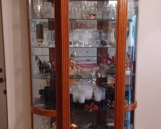 Nice curio cabinet filled with collectibles