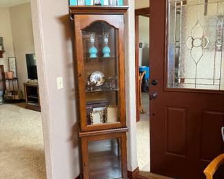 Lighted curio cabinet.