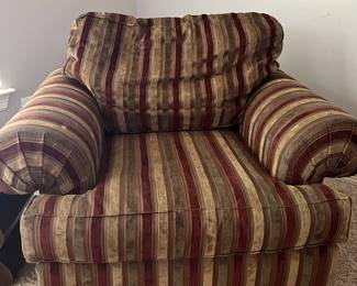 Oversize striped chair. It also has a matching ottoman.