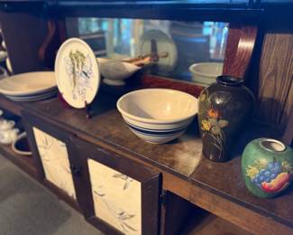 Assorted mixing bowls and vases