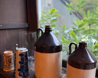 Assorted brown and white jugs