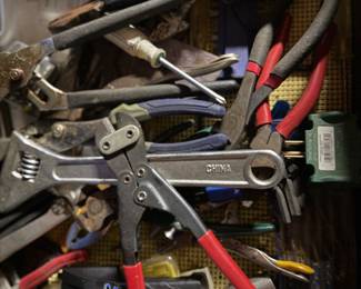 Assorted wrenches, pliers, screwdrivers
