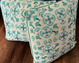Pair Kim Seybert decorative pillows in cream and teal
