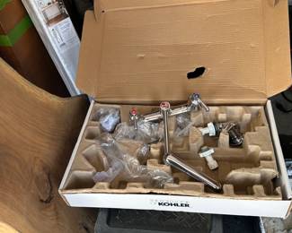 faucet with jointed arm