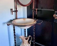 Mirrored washbowl and pitcher w/towel hangers