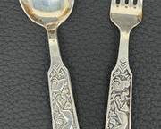Vintage David Andersen Children's Sterling Silver Fork and Spoon Set
A fabulous vintage (circa 1937) solid silver child's spoon and fork set, featuring the "Rev, Bjørn, Hare" (rabbit, fox, bear) pattern to the handle. Marked to the reverse for 830s grade silver, alongside the makers mark of world renowned Norwegian silversmith David Andersen
Marked 830