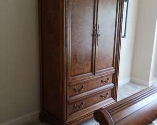 Armoire / entertainment center that matches bedroom set. It is 46" wide x 78" tall and 22" deep.