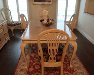 another view of table and chairs The table is 68 X 45 and one 14" leaf