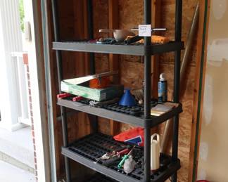 plastic shelf and garage items