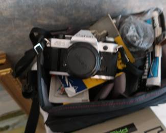 cannon ae-1 camera and additional lens