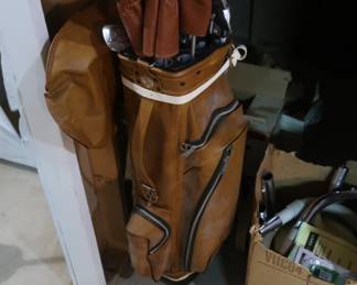 golf clubs and cart