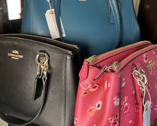 Collection of Coach Purses still with original tags