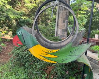 Interesting parrot garden sculpture made from on old tire