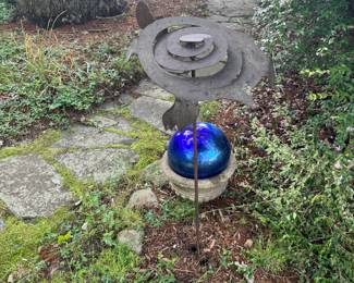 Garden art with blue wishing ball