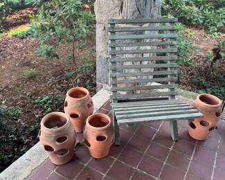 strawberry planters and vintage chair