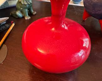 Brilliant red pottery vase.