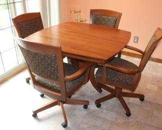 42” x 42” 4 swivel chairs, 1 leaf 12” And table pads