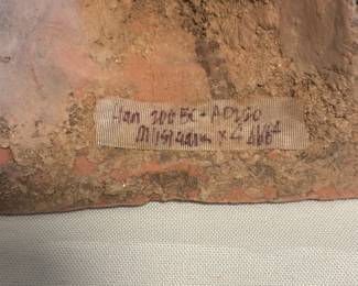 Notations on the bottom of one of the Han Dynasty terracotta figures.