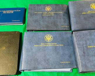 Five binders 1978, 1979, 1980, 1982, 1983. Each contains a collection of First Day Stamp Covers, with replicas on each page in either 14 or 23 Karat Gold.