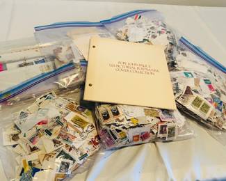 Five bags of loose stamps also first day covers for Pope John Paul II, who was head of the Catholic Church from 1978 until his death in 2005