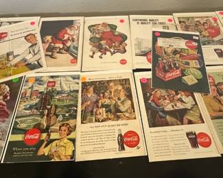 Seventeen Coca-cola magazine advertising pages from the 1050s.