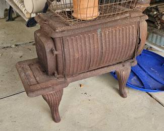 Antique cast iron wood burning stone