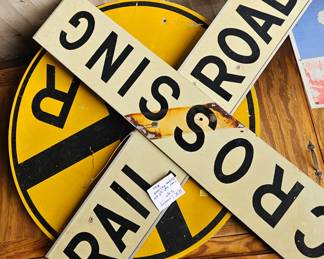 Metal rail road crossing signs