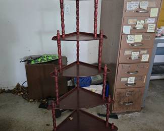 Wood corner shelf.