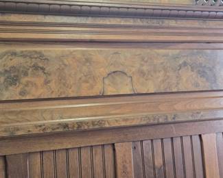 Antique heavily carved Bed and matching mirror.