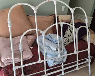 Antique cast iron bed, with rails.