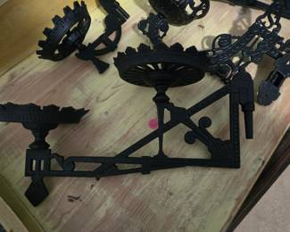 Oil lamp cast iron wall holders.