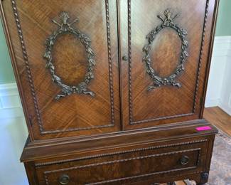 Beautiful Carved wood Cabinet with shelves.