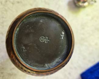 Roycroft vase bottom. Signed.